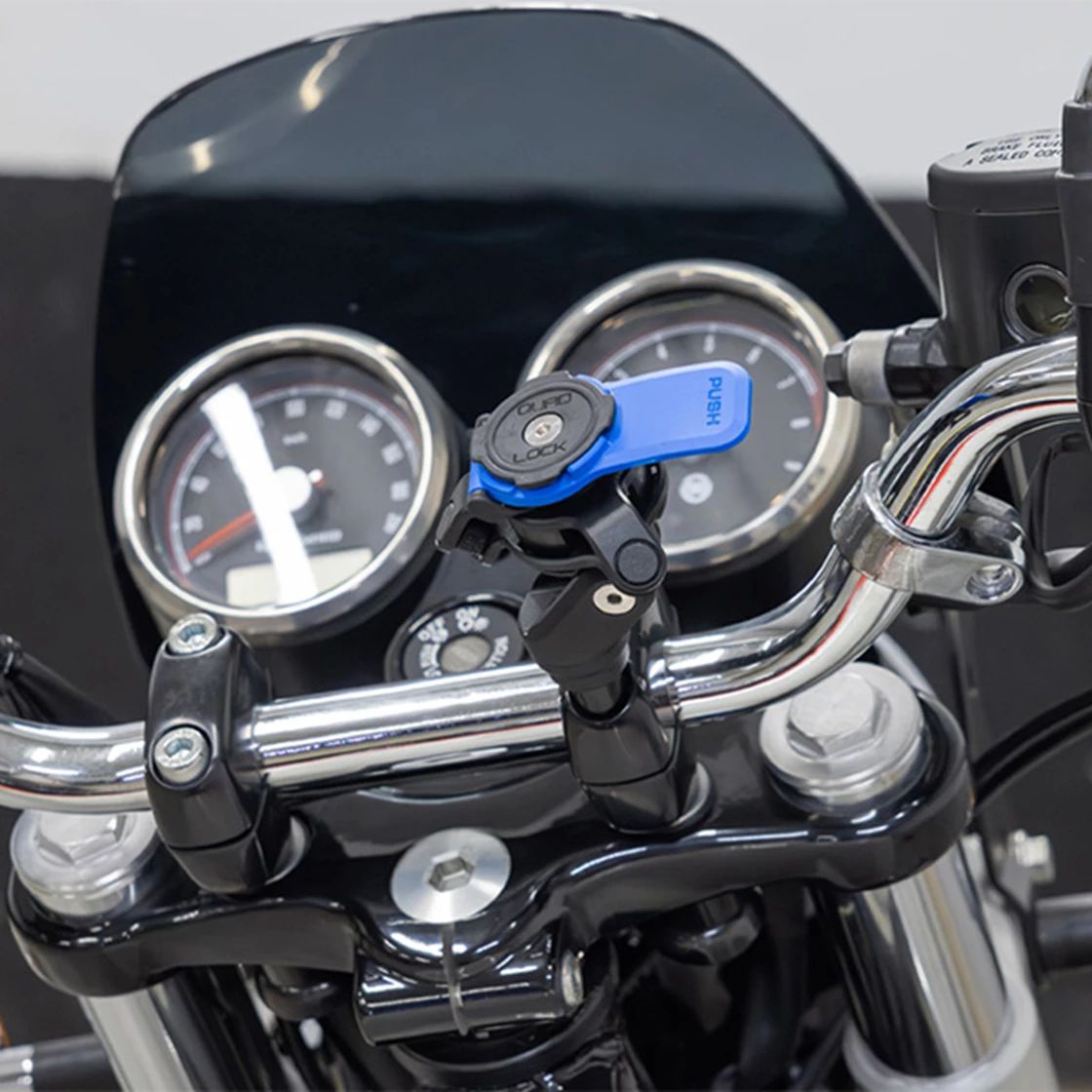 Quad Lock® Styrklämma Telefonfäste